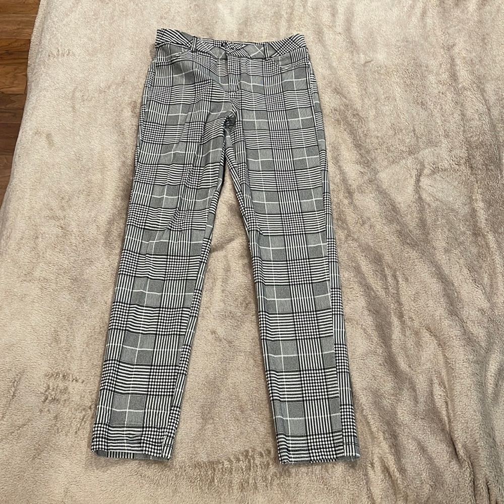 Grey and white checkered pattern pants. Size L